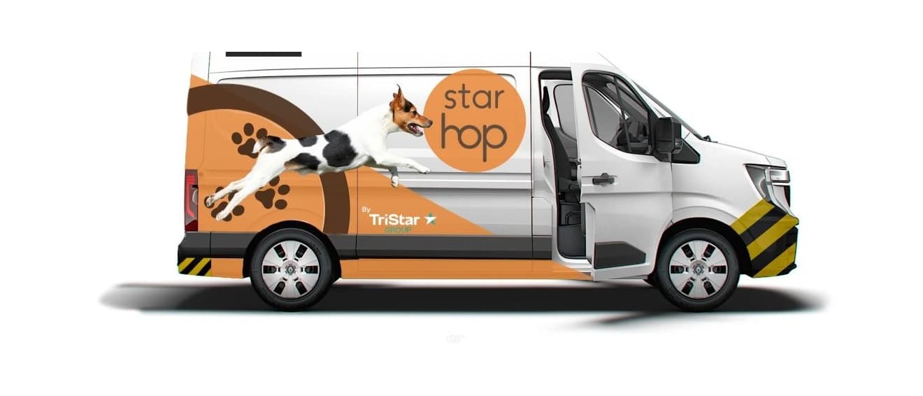 Van da Star Hop, parceira de experiência premium, com identidade visual e o mascote da marca